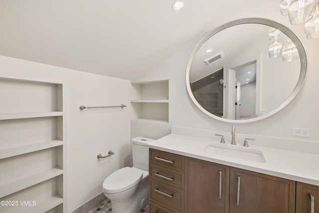 bathroom featuring vanity, built in features, visible vents, vaulted ceiling, and toilet