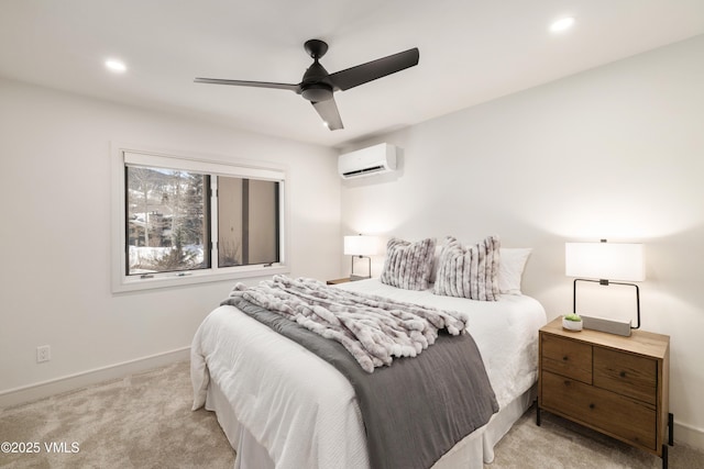 carpeted bedroom featuring an AC wall unit, recessed lighting, baseboards, and ceiling fan