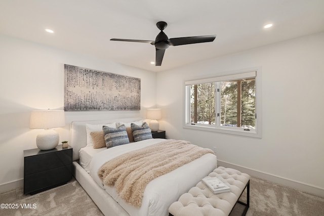 carpeted bedroom featuring recessed lighting, baseboards, and ceiling fan