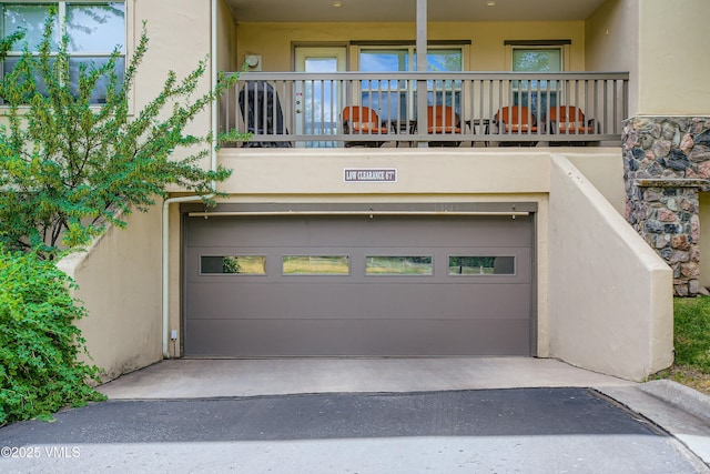 55 River Pines Ct Unit A204, Edwards, CO 81632 - garage featuring asphalt driveway