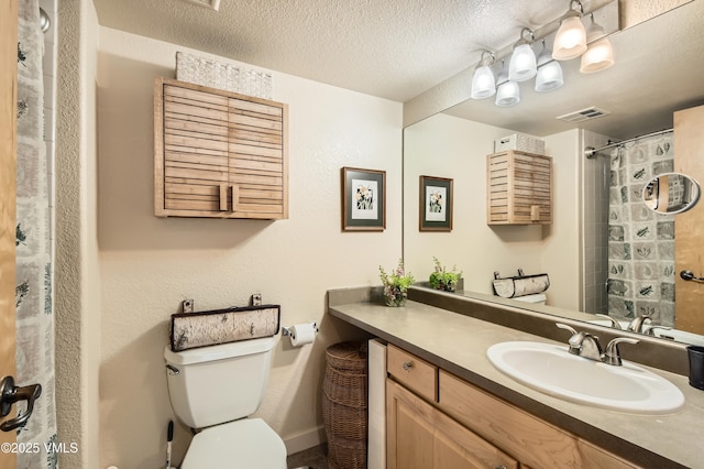 55 River Pines Ct Unit A204, Edwards, CO 81632 - full bathroom featuring vanity, a textured ceiling, and a shower with shower curtain