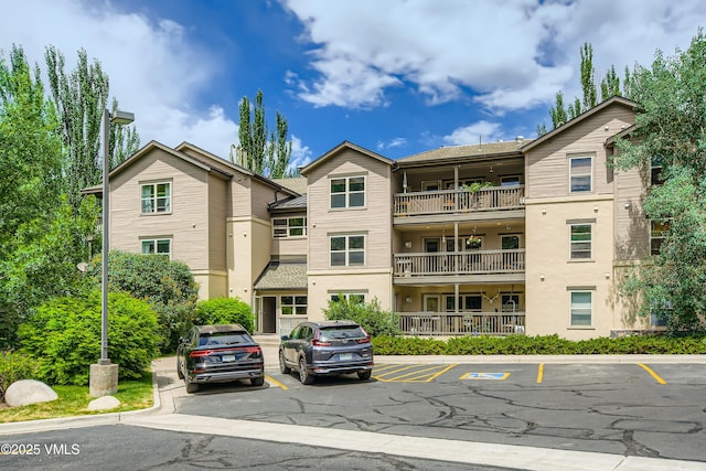 55 River Pines Ct Unit A204, Edwards, CO 81632 - view of property featuring uncovered parking