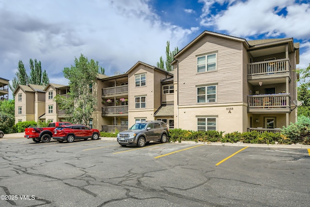 55 River Pines Ct Unit A204, Edwards, CO 81632 - view of apartment building / complex with uncovered parking