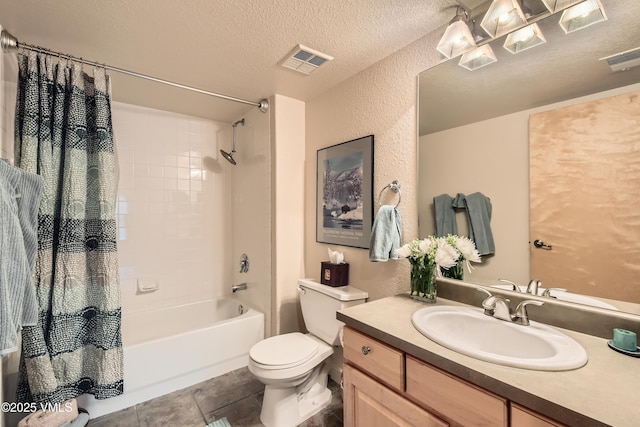 55 River Pines Ct Unit A204, Edwards, CO 81632 - bathroom featuring shower / tub combo, vanity, a textured ceiling, and a textured wall