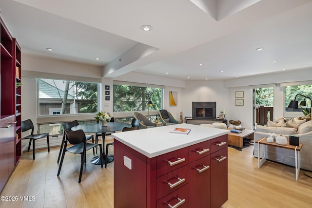 103 Willow Pl Unit 301, Vail, CO 81657 - kitchen featuring plenty of natural light, light wood-type flooring, open floor plan, and recessed lighting