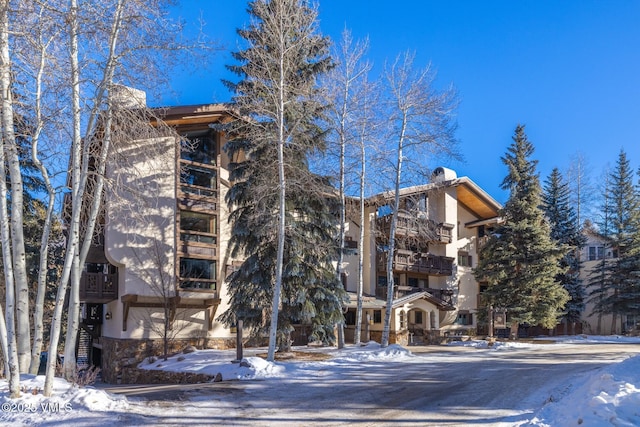 view of snow covered property