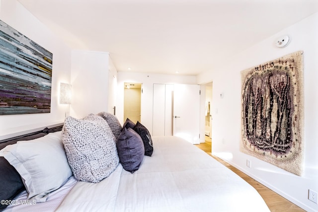 103 Willow Pl Unit 301, Vail, CO 81657 - bedroom with light wood-style flooring and baseboards