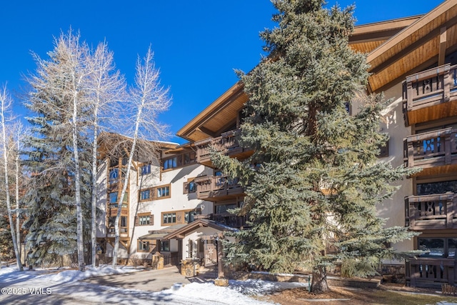 view of snow covered property