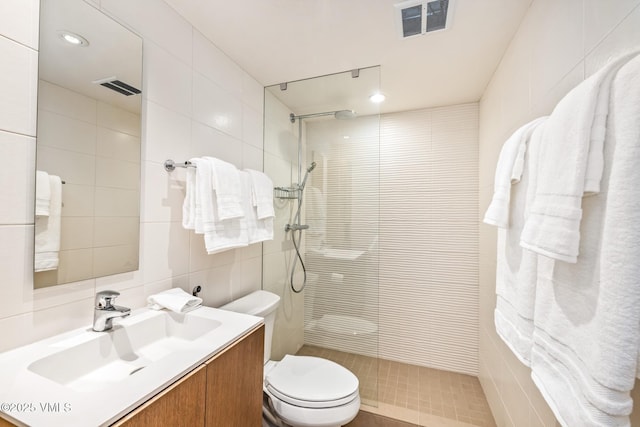 103 Willow Pl Unit 301, Vail, CO 81657 - full bath featuring tile walls, vanity, and a walk in shower