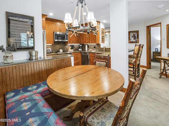 120 Offerson Rd Unit 6140, Beaver Creek, CO 81620 - dining area featuring a chandelier, light carpet, and recessed lighting