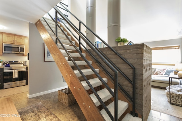 stairway with baseboards