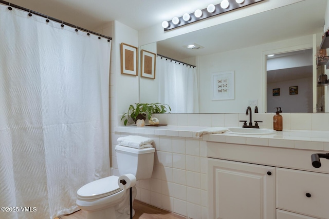971 Winslow Rd, Edwards, CO 81632 - full bathroom with toilet, vanity, and a shower with shower curtain