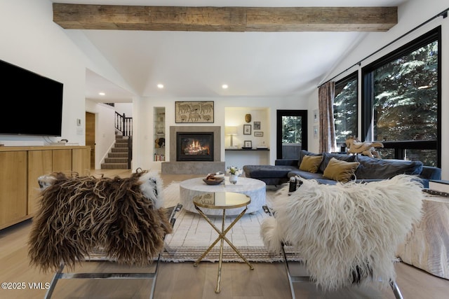 971 Winslow Rd, Edwards, CO 81632 - living room featuring a glass covered fireplace, wood finished floors, stairway, and recessed lighting