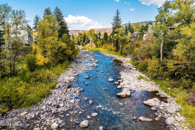 property view of water featuring a mountain view