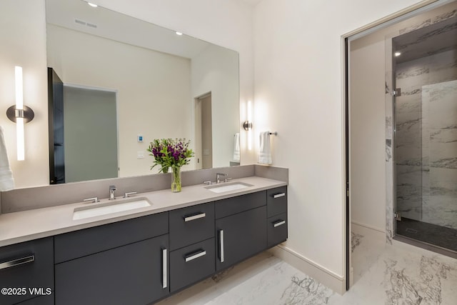 0599 Gray Rock Dr, Eagle, CO 81631 - full bath featuring marble finish floors, double vanity, a marble finish shower, and recessed lighting