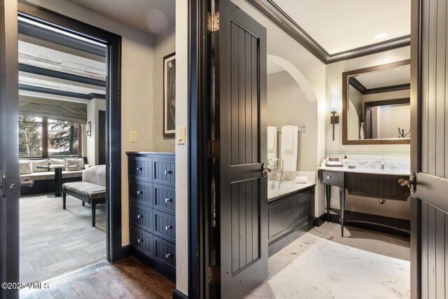 bathroom with crown molding