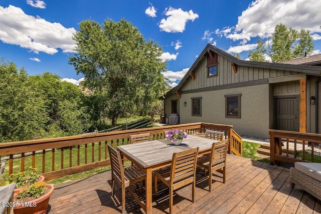 674 Hernage Creek Rd, Eagle, CO 81631 - wooden deck with outdoor dining area and a yard
