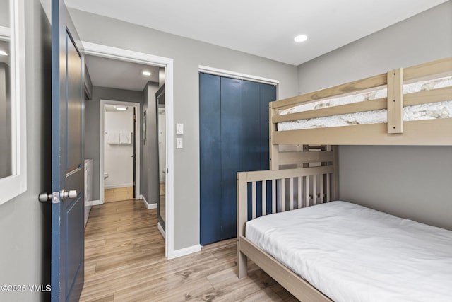 1061 W Beaver Creek Blvd Unit F101, Avon, CO 81620 - bedroom with light wood finished floors, baseboards, a closet, and recessed lighting