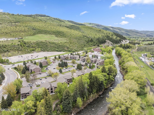 1061 W Beaver Creek Blvd Unit F101, Avon, CO 81620 - aerial view of property and surrounding area featuring a mountainous background