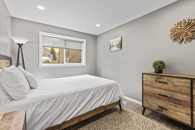 1061 W Beaver Creek Blvd Unit F101, Avon, CO 81620 - bedroom with wood finished floors, recessed lighting, and baseboards