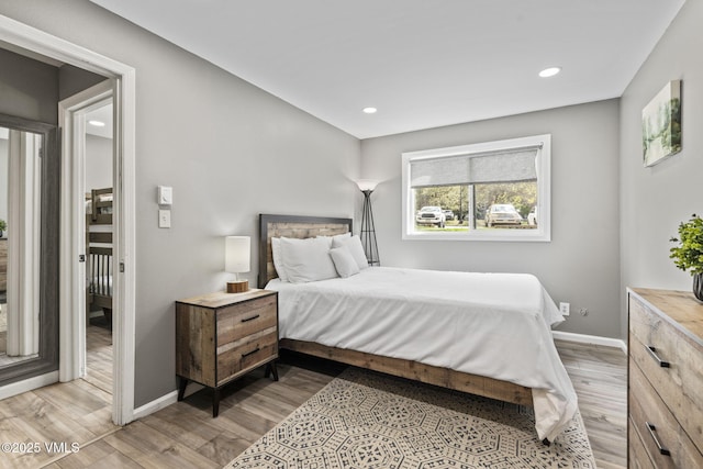 1061 W Beaver Creek Blvd Unit F101, Avon, CO 81620 - bedroom with baseboards, light wood-style floors, and recessed lighting