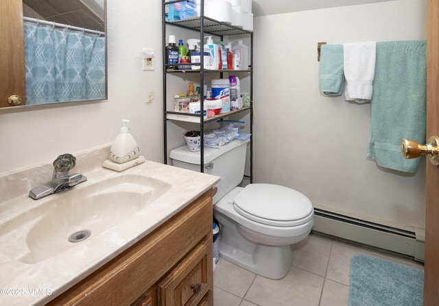 409 Washington St, Eagle, CO 81631 - bathroom with a baseboard radiator, tile patterned flooring, toilet, vanity, and a shower with curtain
