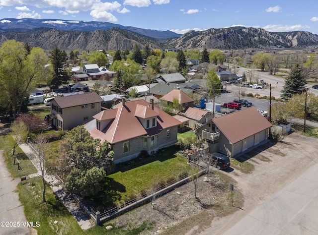 409 Washington St, Eagle, CO 81631 - aerial perspective of suburban area with a mountainous background