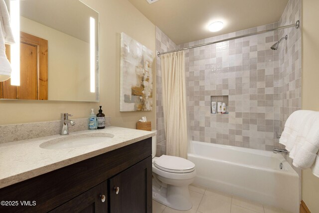 full bathroom with shower / tub combo with curtain, vanity, toilet, and tile patterned flooring