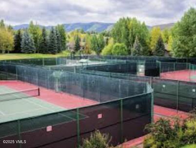 50 Andover Trl, Edwards, CO 81632 - view of tennis court featuring fence and a mountain view