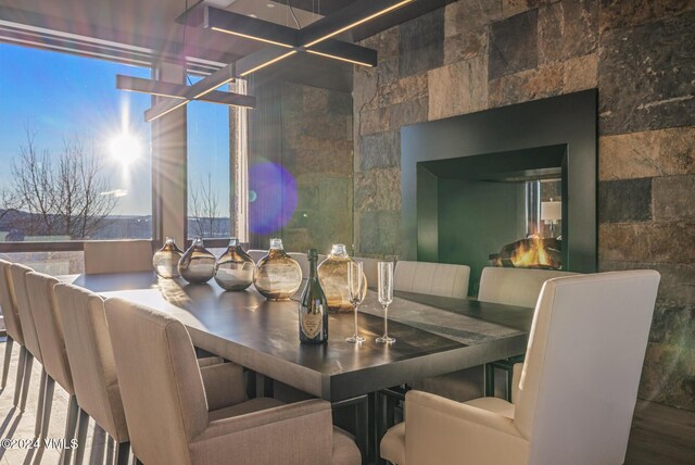 dining space featuring a healthy amount of sunlight and wood finished floors