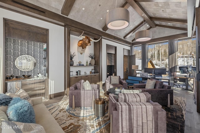 living room featuring vaulted ceiling with beams and baseboards