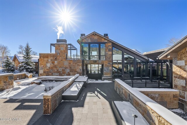 view of snow covered patio