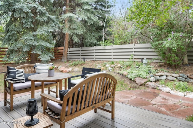 103 Meile Ln, Edwards, CO 81632 - wooden deck featuring a fenced backyard and outdoor dining space