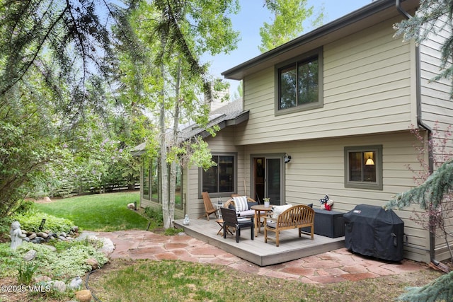 103 Meile Ln, Edwards, CO 81632 - back of house with a yard, a deck, outdoor lounge area, and a patio