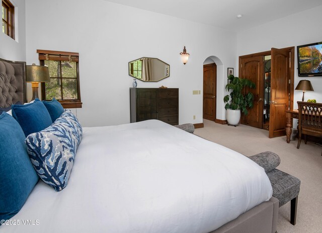 2241 Tahoe Dr, Vail, CO 81657 - bedroom with light carpet and arched walkways