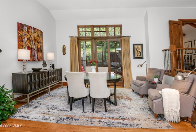 2241 Tahoe Dr, Vail, CO 81657 - dining room featuring vaulted ceiling and wood finished floors