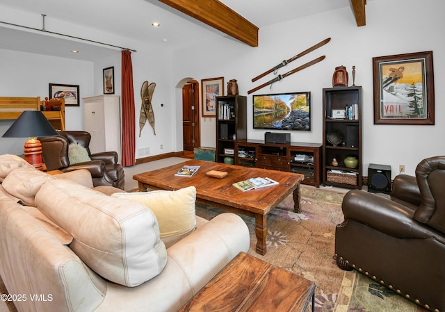 2241 Tahoe Dr, Vail, CO 81657 - living room with arched walkways, beam ceiling, and recessed lighting
