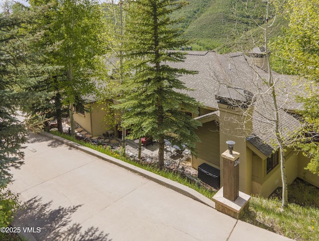 2241 Tahoe Dr, Vail, CO 81657 - view of side of property featuring a shingled roof
