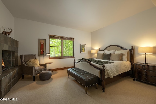 2241 Tahoe Dr, Vail, CO 81657 - bedroom featuring carpet flooring, a tiled fireplace, and baseboards