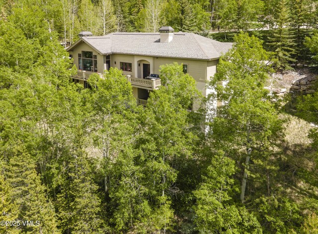 2241 Tahoe Dr, Vail, CO 81657 - aerial view of property and surrounding area featuring a heavily wooded area