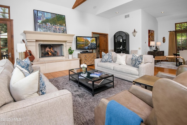 2241 Tahoe Dr, Vail, CO 81657 - living area with wood finished floors, a warm lit fireplace, and recessed lighting