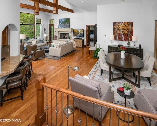 2241 Tahoe Dr, Vail, CO 81657 - living room with wood finished floors, vaulted ceiling, recessed lighting, and arched walkways