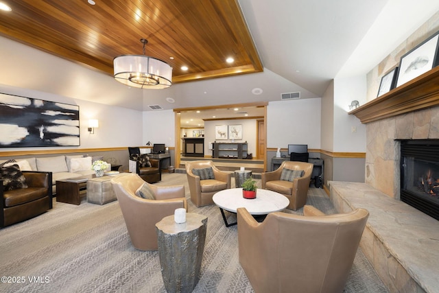 684 W Lionshead Cir Unit 304, Vail, CO 81657 - living area featuring a tiled fireplace, recessed lighting, lofted ceiling, and wood ceiling