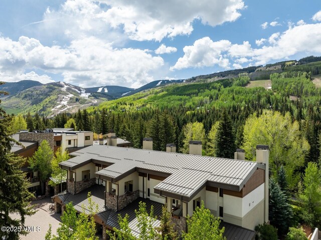 380 E Lionshead Cir Unit 160, Vail, CO 81657 - view of mountain backdrop featuring a heavily wooded area