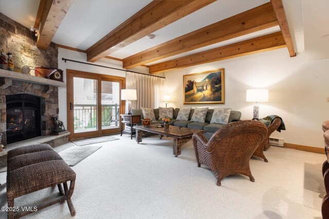 380 E Lionshead Cir Unit 160, Vail, CO 81657 - living area featuring beam ceiling, carpet flooring, baseboard heating, a fireplace, and baseboards