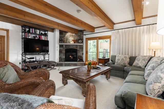 380 E Lionshead Cir Unit 160, Vail, CO 81657 - carpeted living area featuring beamed ceiling and a fireplace