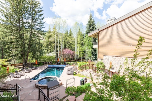 380 E Lionshead Cir Unit 160, Vail, CO 81657 - view of pool featuring a patio and a fenced backyard