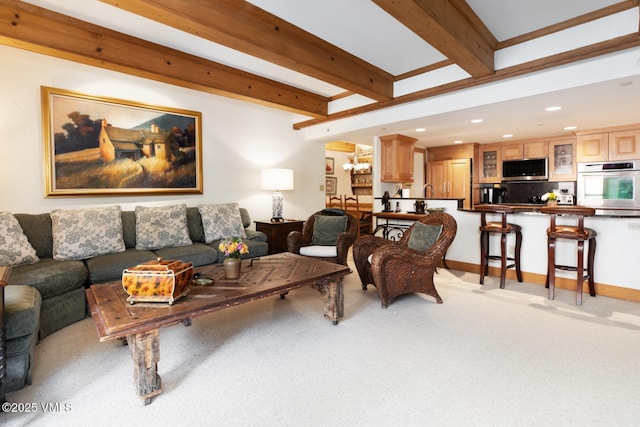 380 E Lionshead Cir Unit 160, Vail, CO 81657 - living area featuring beam ceiling, light carpet, and recessed lighting
