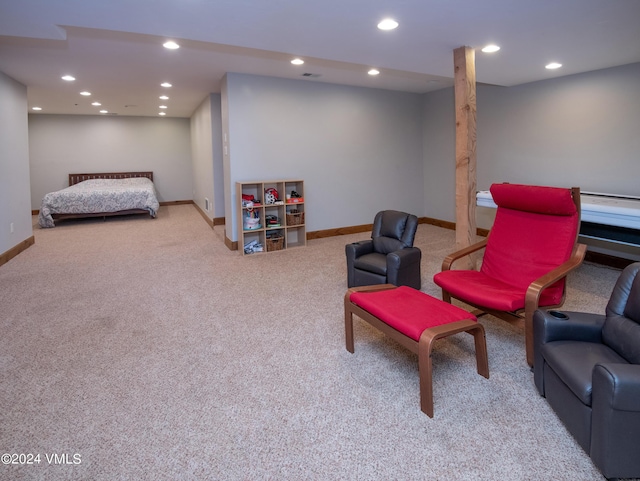 sitting room with carpet floors, baseboards, and recessed lighting