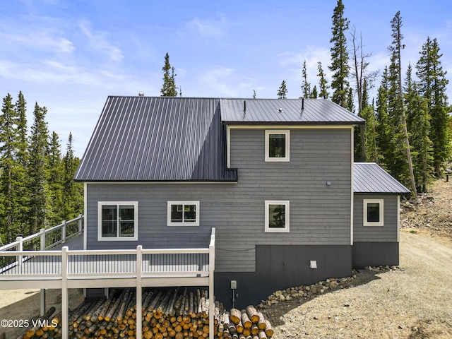 408 El Lobo Ln, Fairplay, CO 80440 - rear view of property featuring a wooden deck and a metal roof